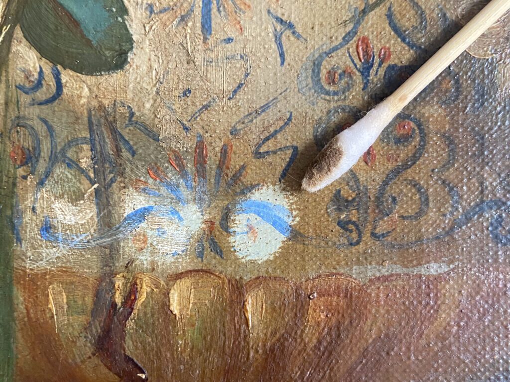 come pulire un quadro antico